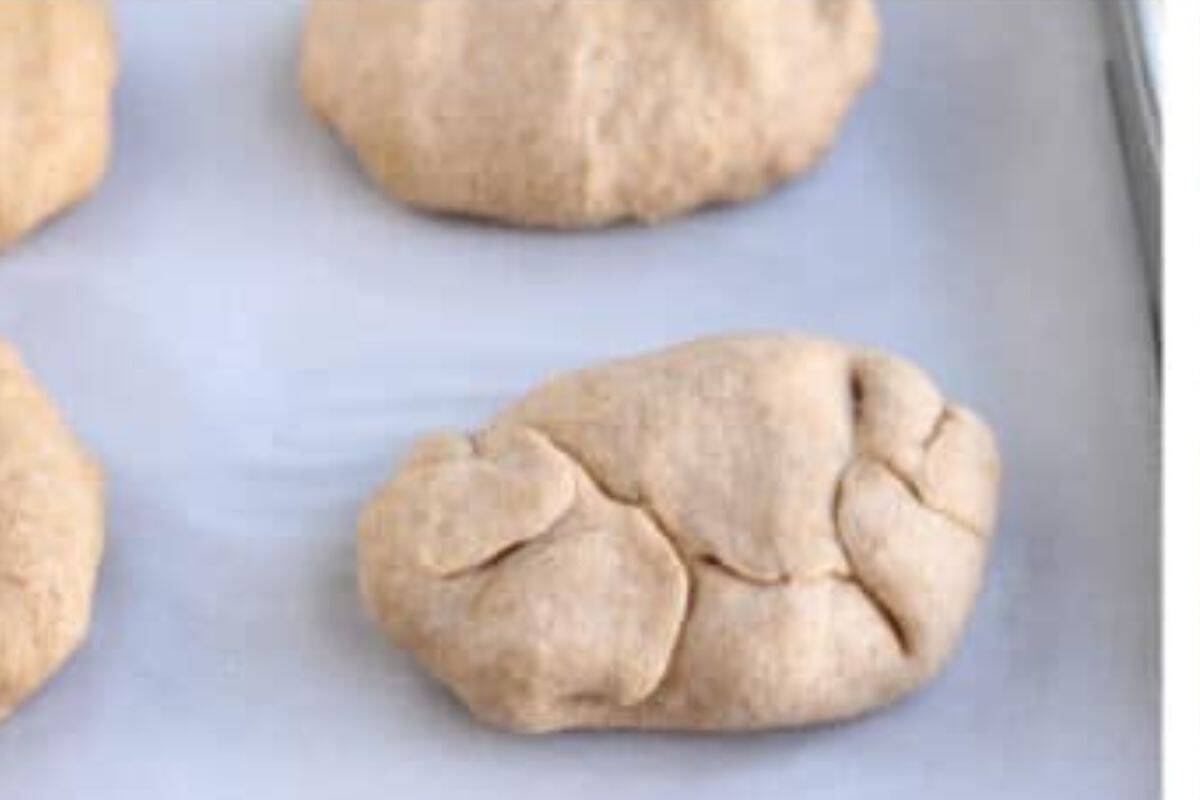 Cheesy meat bun after rolling on pan.