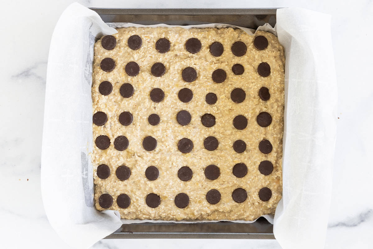 Banana oatmeal bars in pan before baking.