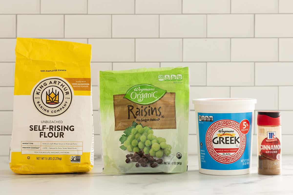 Ingredients for cinnamon bagels on countertop.