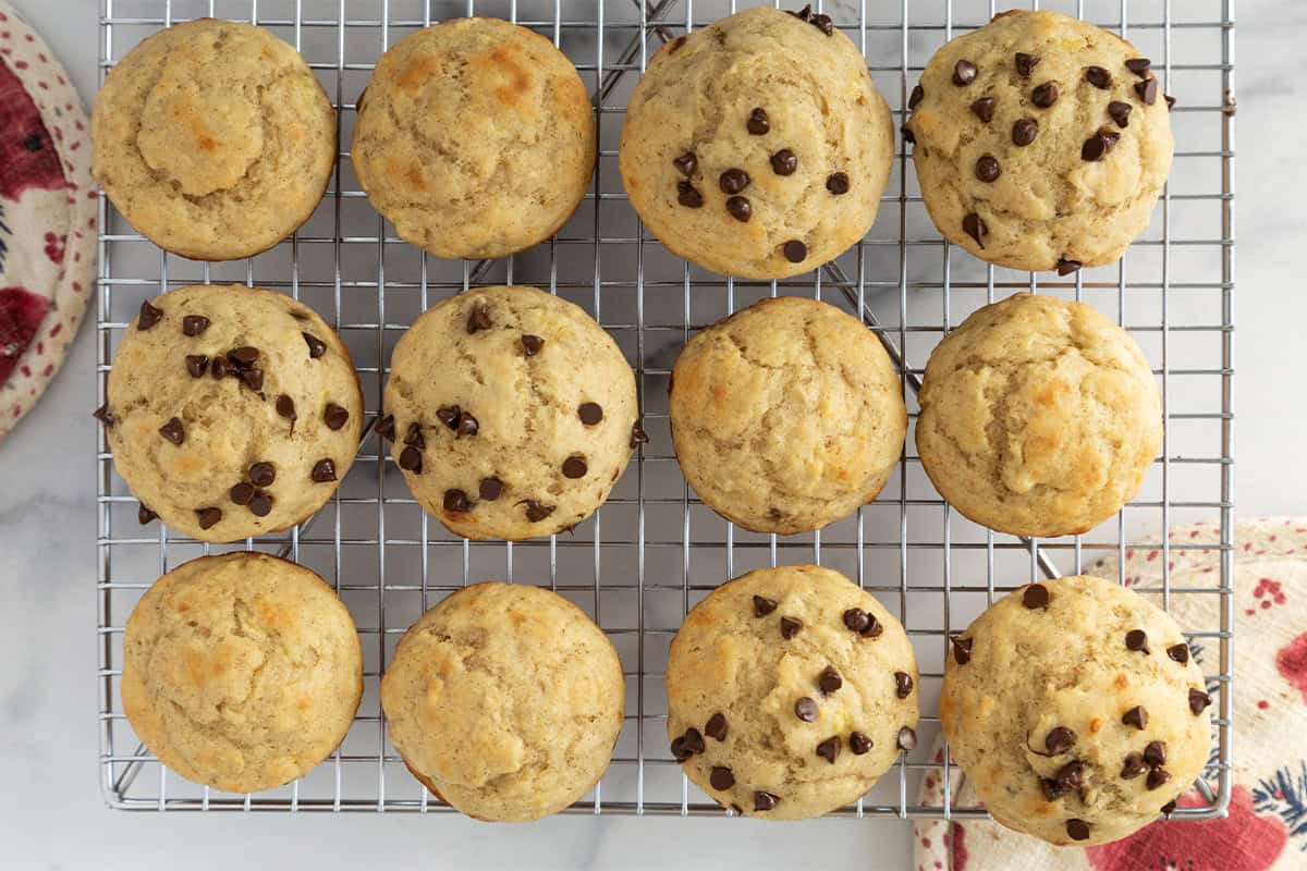 Greek yogurt banana muffins on cooling racks.