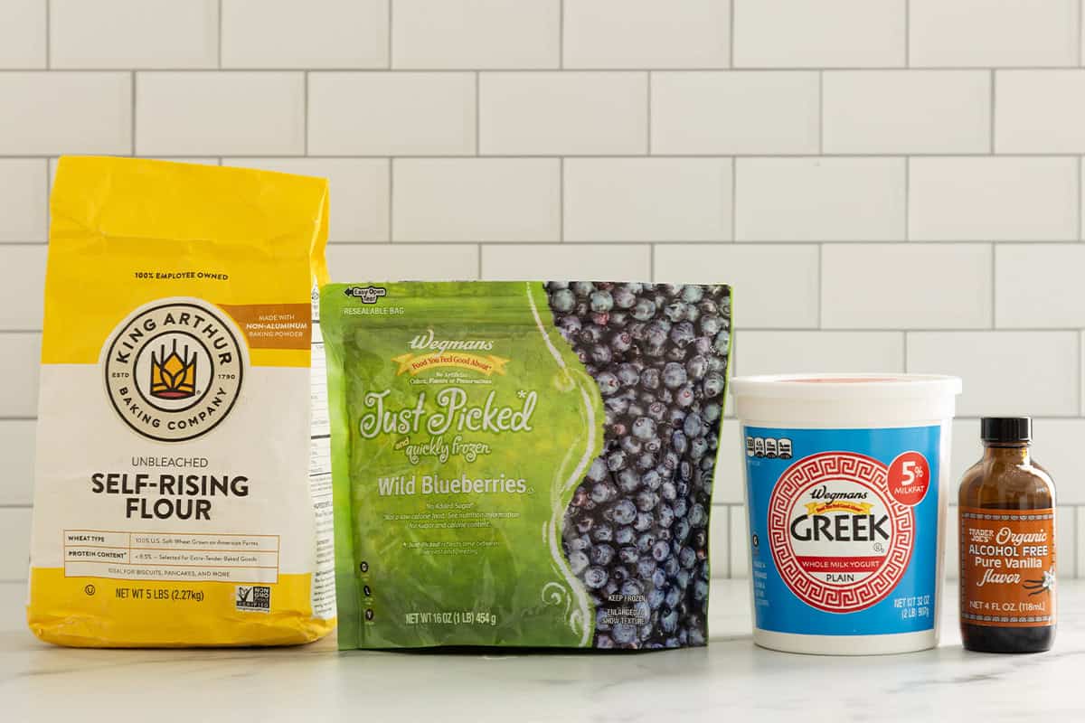 ingredients in blueberry bagels on counter.