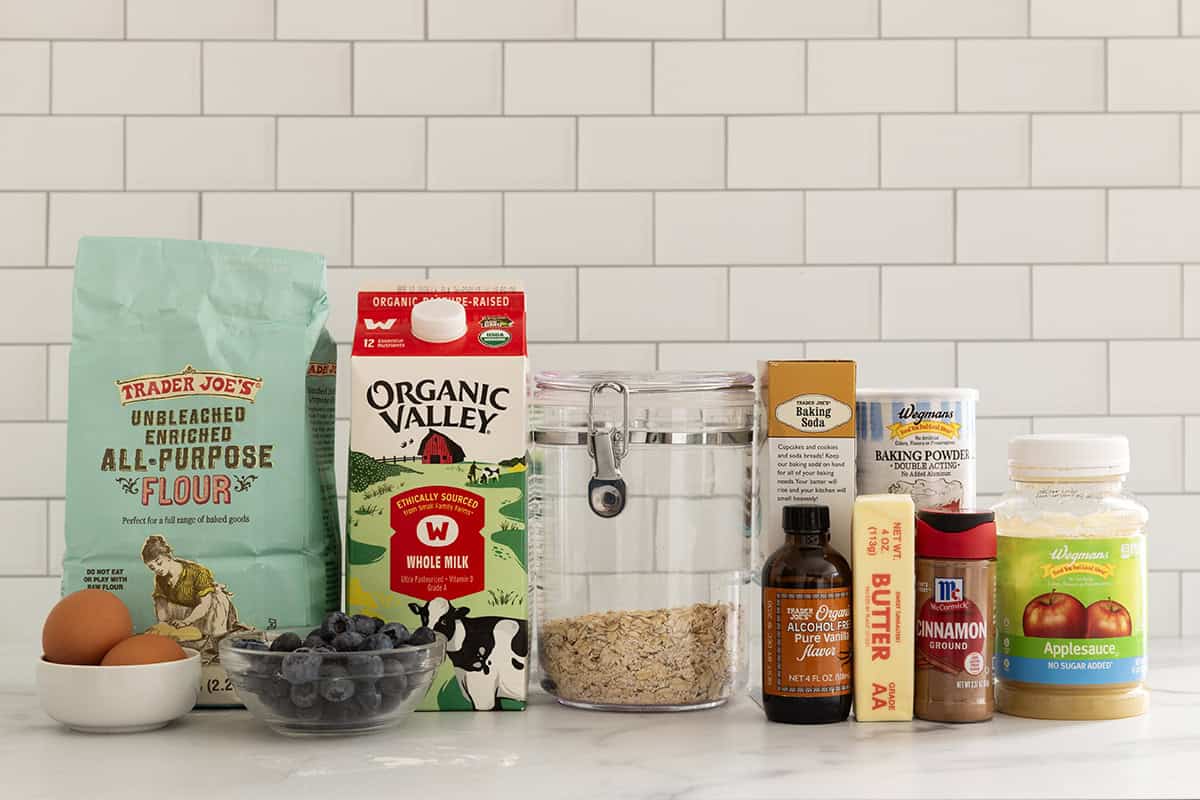 Ingredients for blueberry oatmeal muffins on countertop.