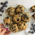 Blueberry oatmeal muffins on plate.