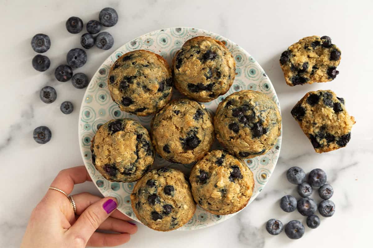 Blueberry oatmeal muffins on plate. 