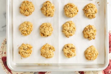 Carrot oatmeal cookies on baking sheet.