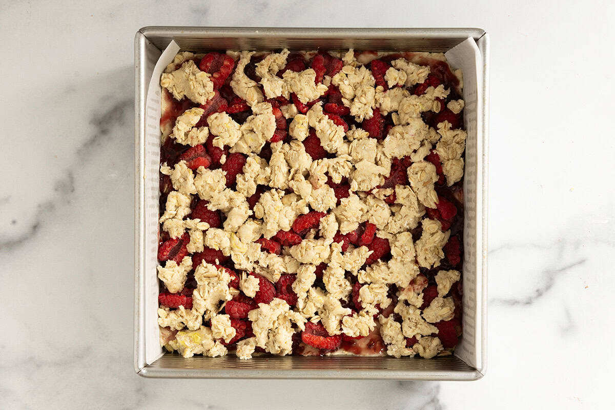 Raspberry oatmeal bars in pan before baking.