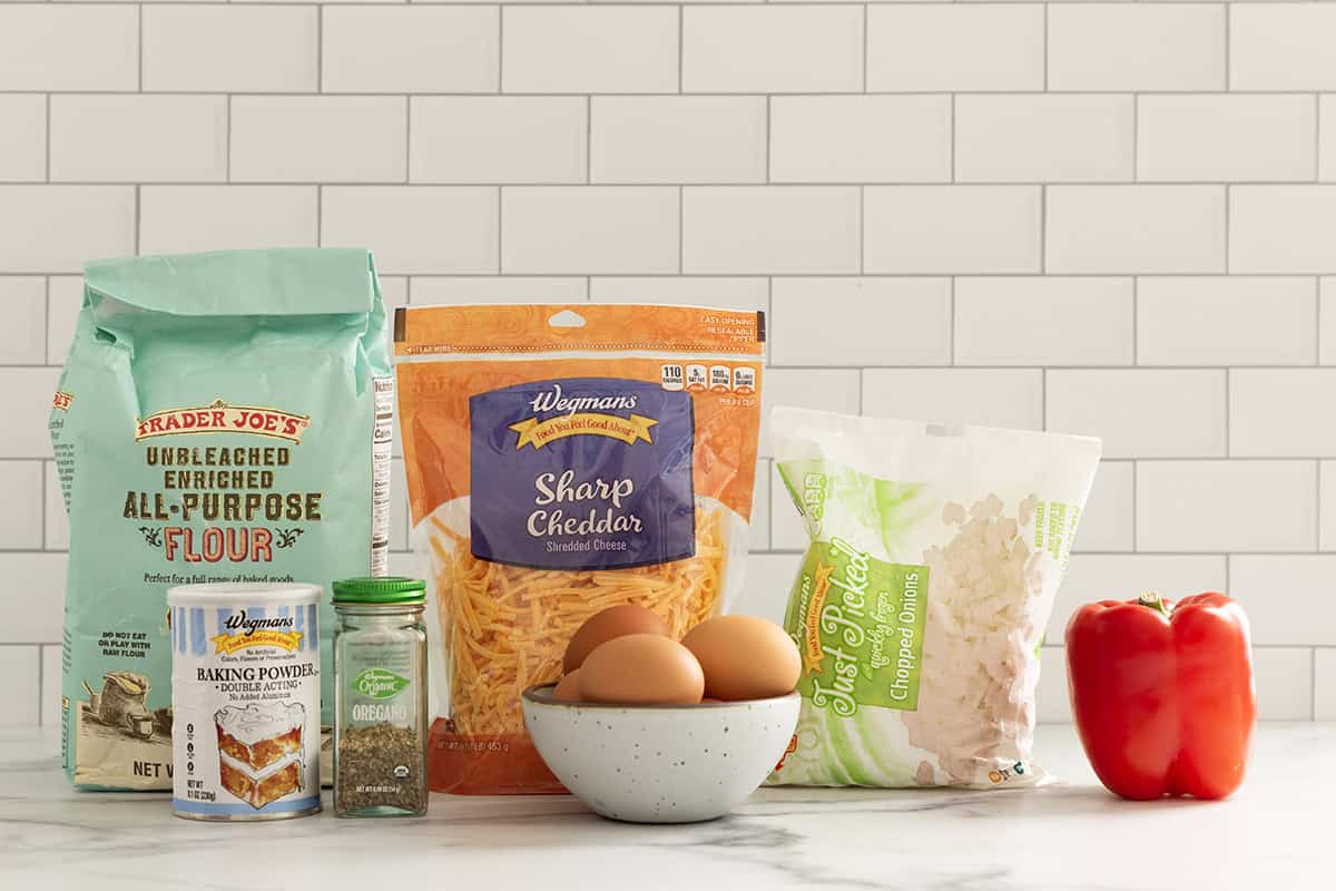 Ingredients for vegetable egg bake on countertop.