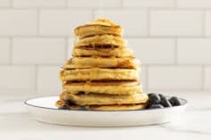 Stack of blueberry banana pancakes.