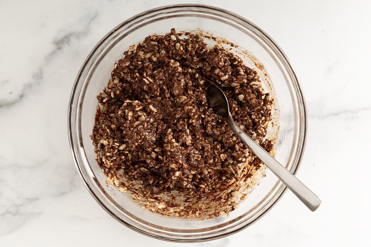 Mixture for chocolate crunch bars in glass bowl.