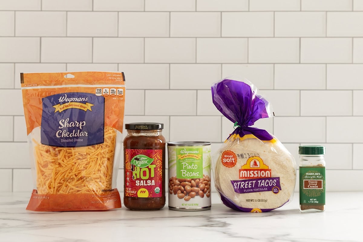 Ingredients for mini tacos on countertop.