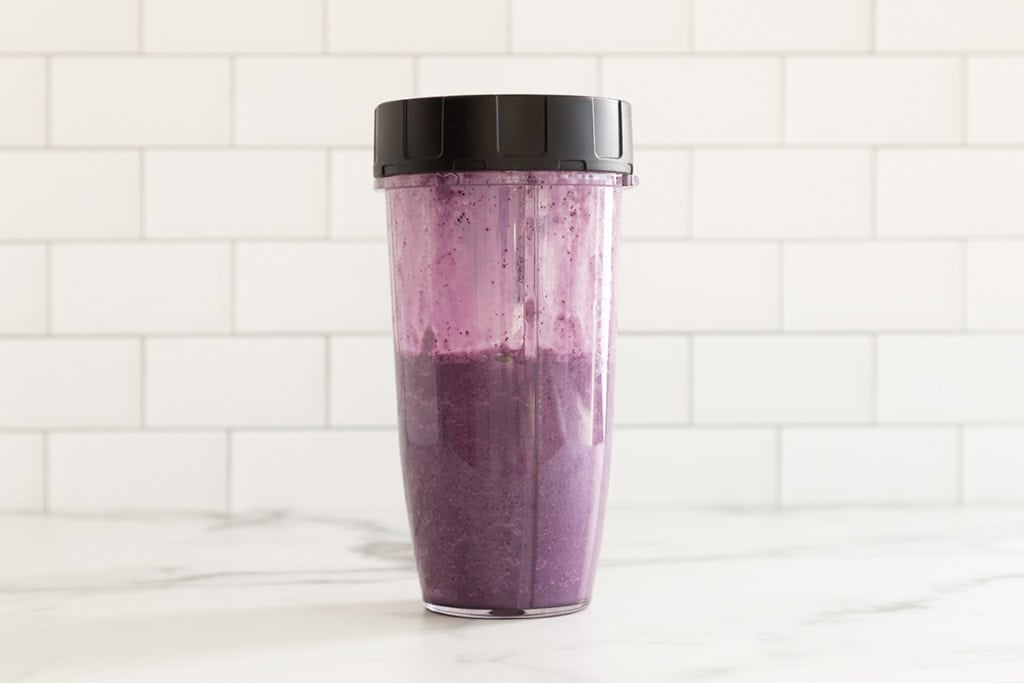 Blueberry milk in blender.