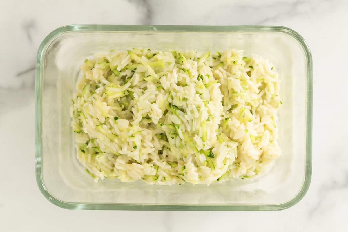 Zucchini rice in storage container.