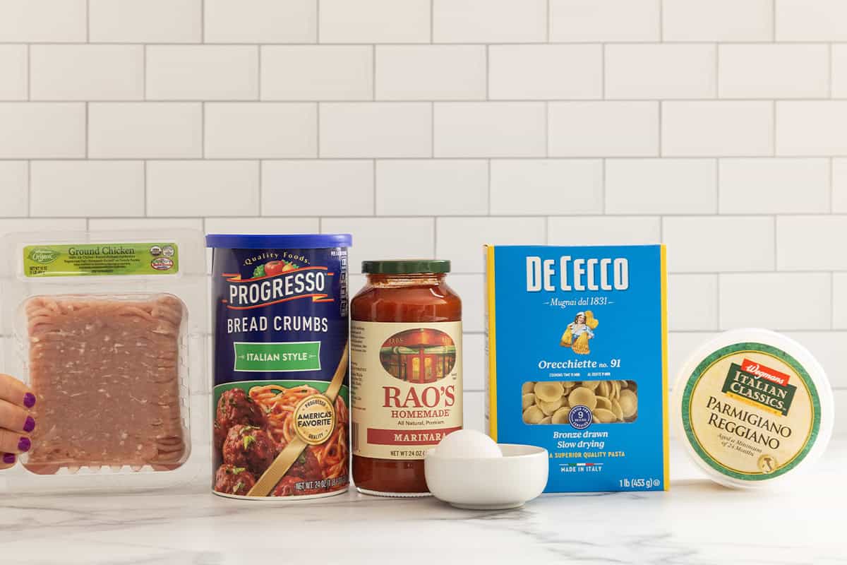 Ingredients for chicken meatball pasta on countertop.