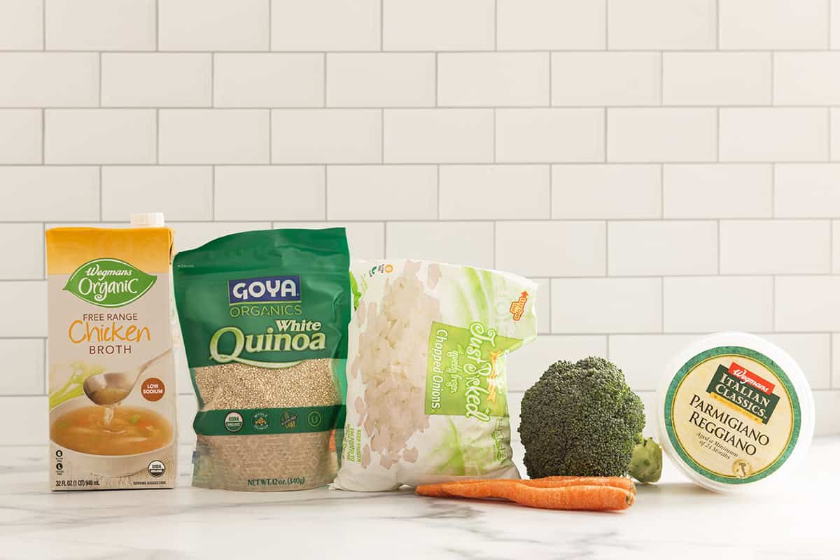 Ingredients for veggie quinoa on countertop.