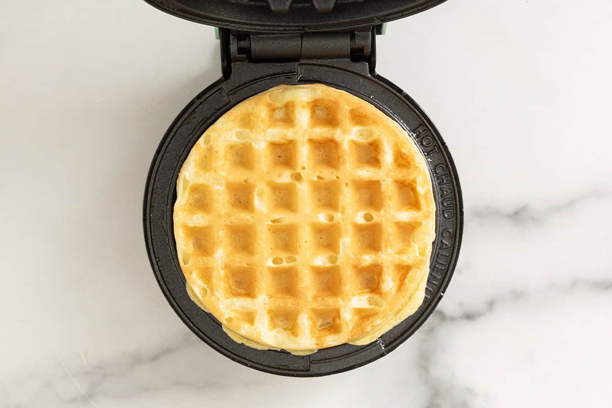 Waffle in waffle iron for waffle sticks.