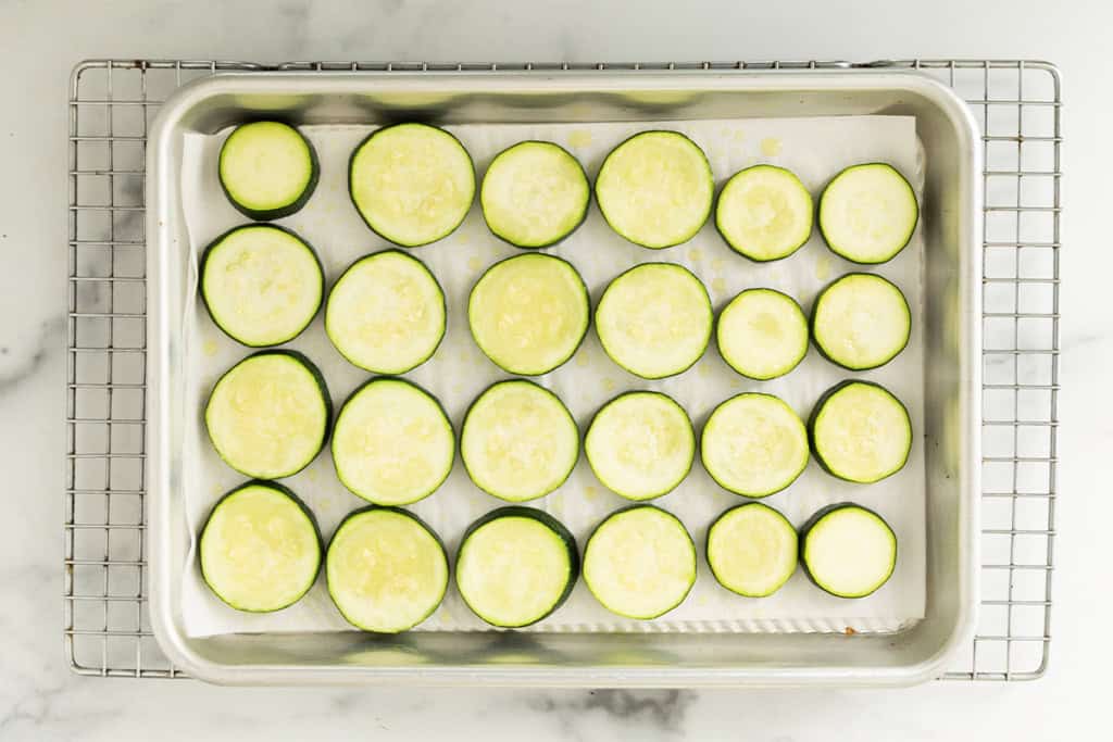 Zucchini slices after baking in over for zucchini pizza bites.