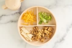 kids plate of ground chicken tacos deconstructed.