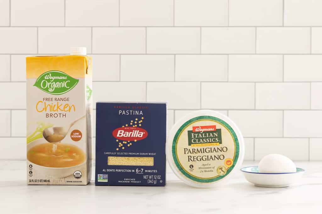 Ingredients for pastina with egg on countertop.