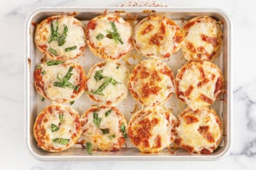 bagel pizza bites on baking pan.