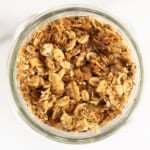 Lower sugar granola in glass jar.