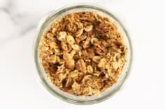 Lower sugar granola in glass jar.