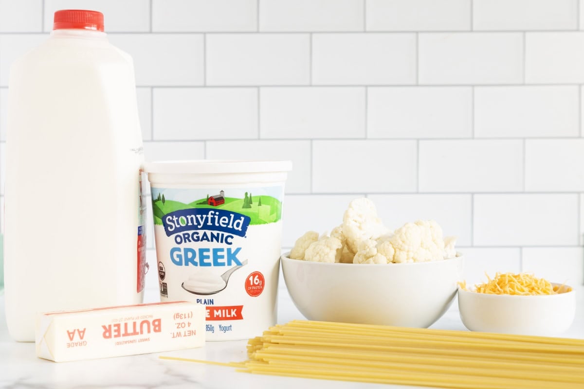 Cauliflower alfredo pasta ingredients on a counter.