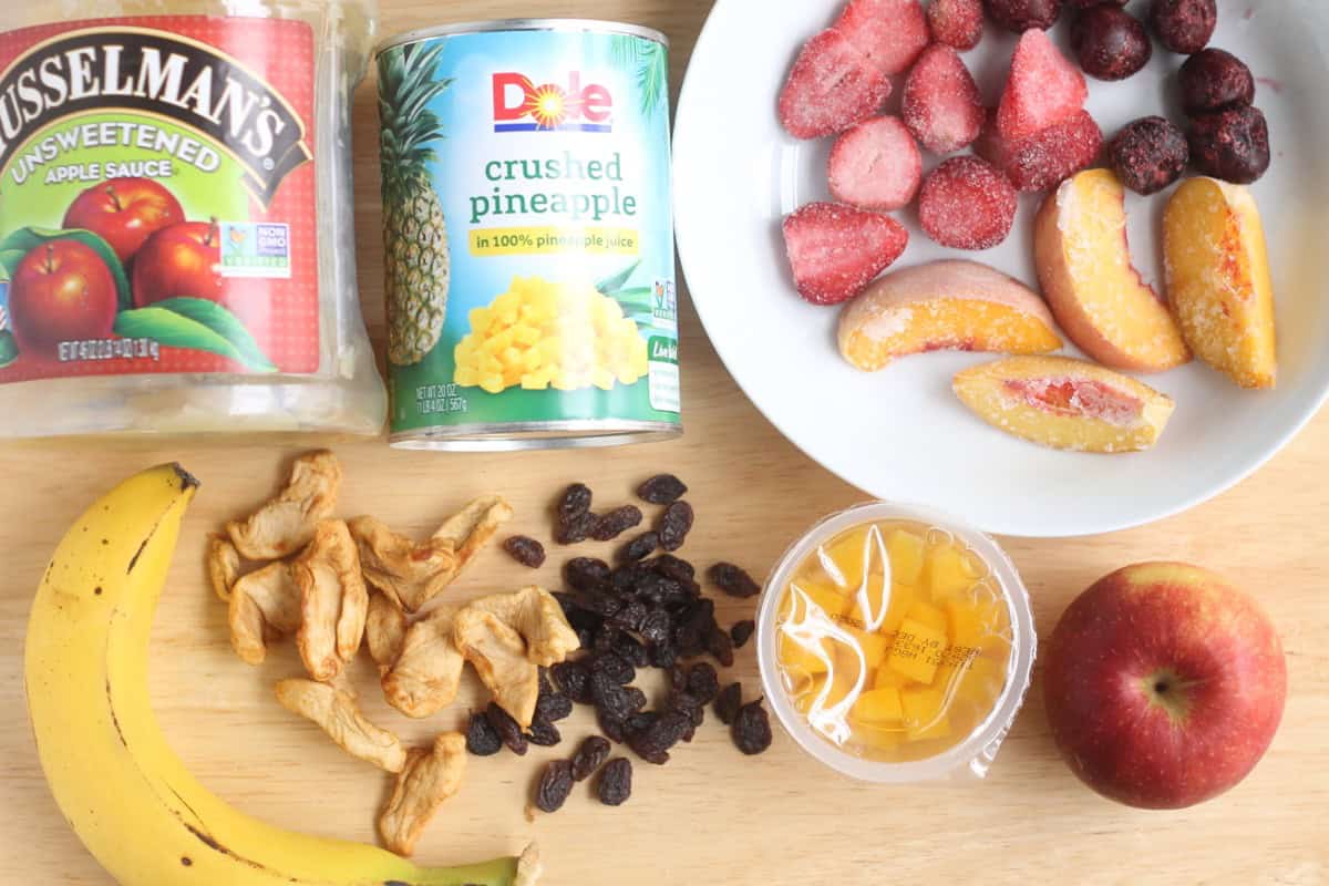 Fruit choices for oatmeal on a cutting board.
