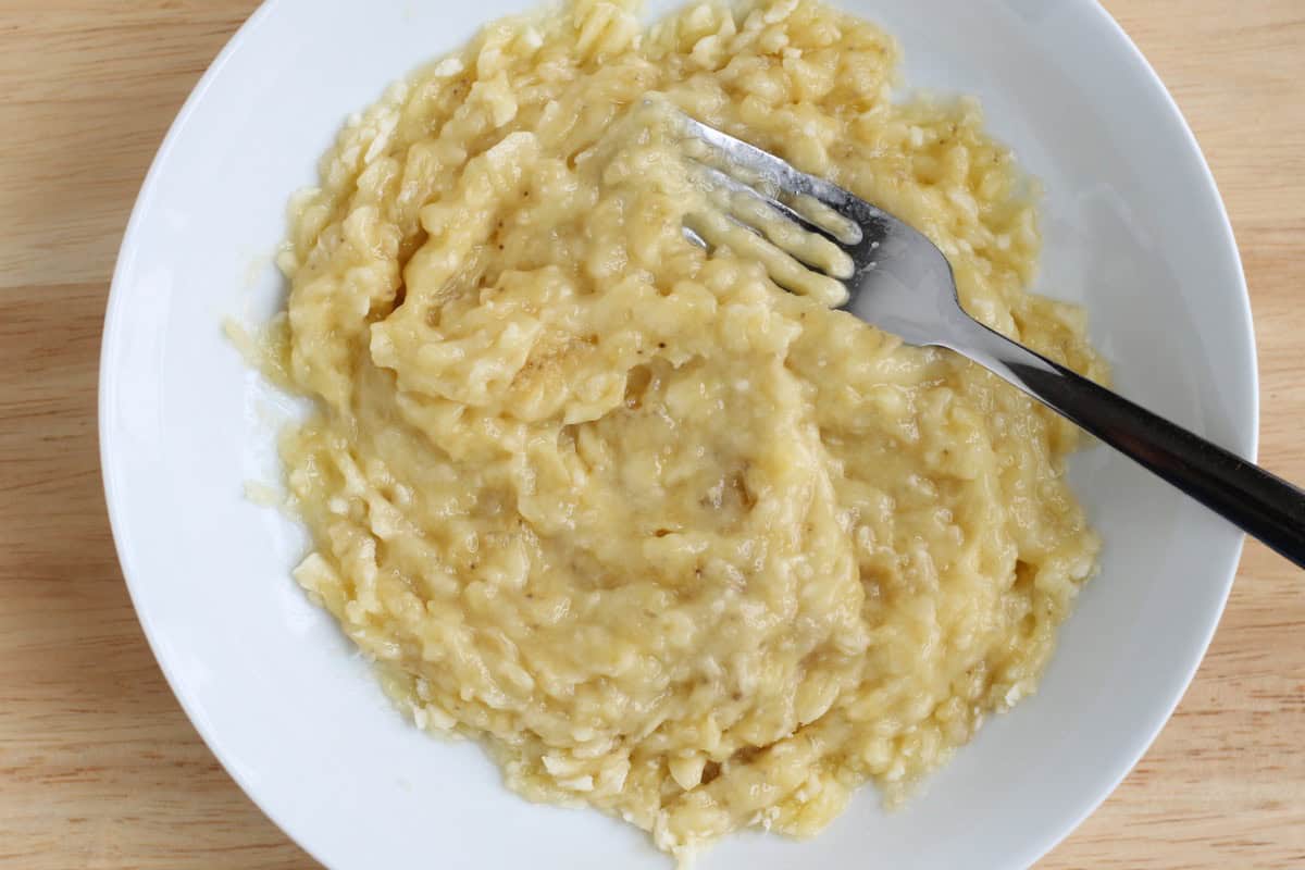 Mashed banana in a bowl.