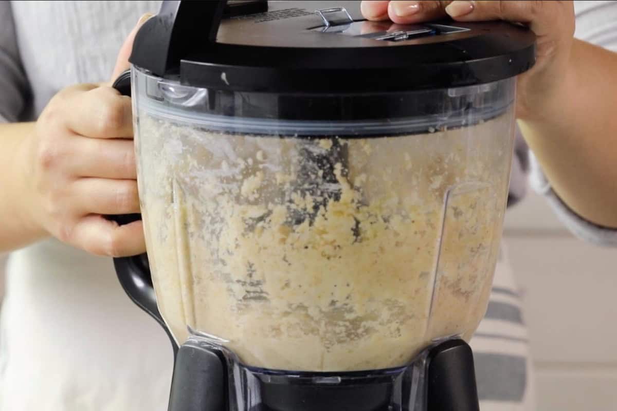 Cauliflower tot mixture blending in a food processor.