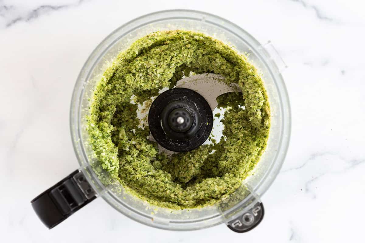 Mixed broccoli fritter batter in a food processor.