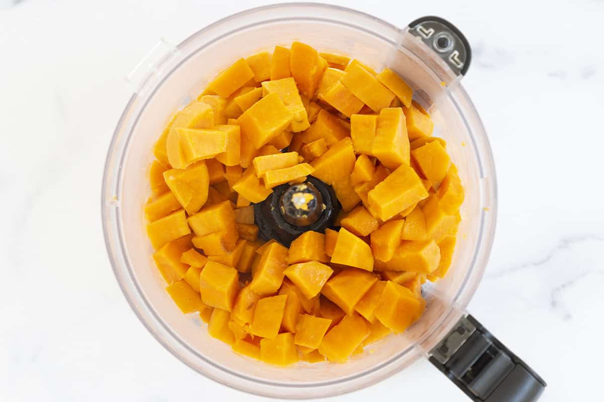 Smooth sweet potato puree in a food processor.