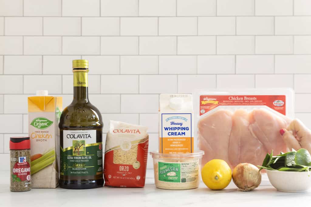 Ingredients for lemon orzo chicken on countertop.