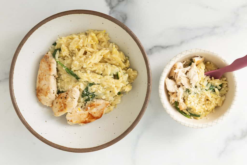 Lemon orzo chicken in two bowls.
